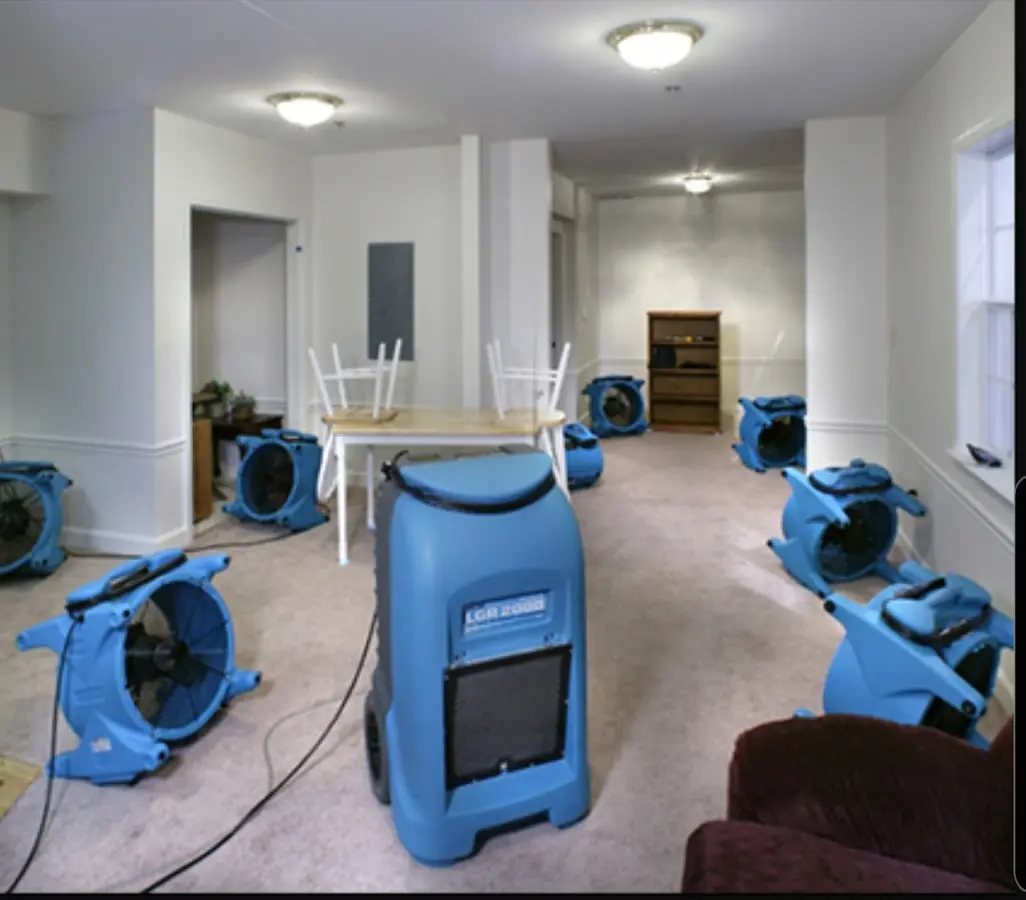 Air movers and dehumidifier setup for Water Damage Restoration in Harborcreek